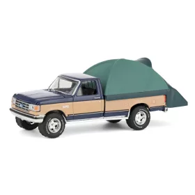   Greenlight - 1:64 1987 Ford F-150 XLT Lariat - Dark Blue and Tan with Modern Truck Bed Tent - The Great Outdoors Series 4